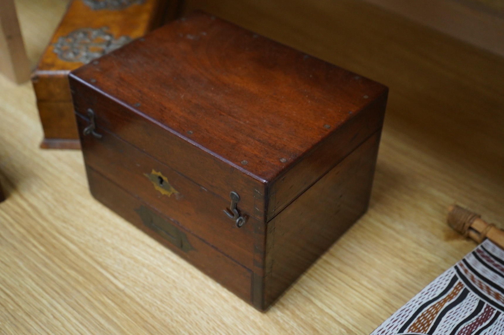 Four boxes to include a burr elm bound example, together with a French inlaid ‘Thé’ caddy with porcelain canisters, largest 32cm wide